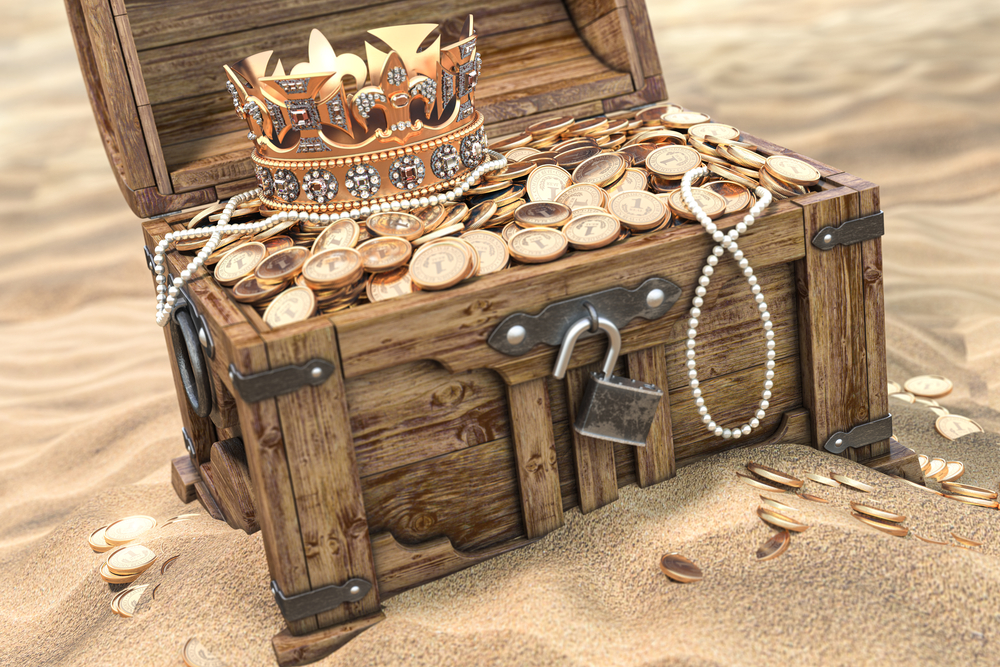Open Treasure Chest Full Of Golden Coins On Sandy Beach. Wealth